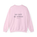 Do Not Be Afraid crewneck sweatshirt — Joshua 1:9 scripture across the back, heartbeat-cross at the chest. Hallowed Supply Co.